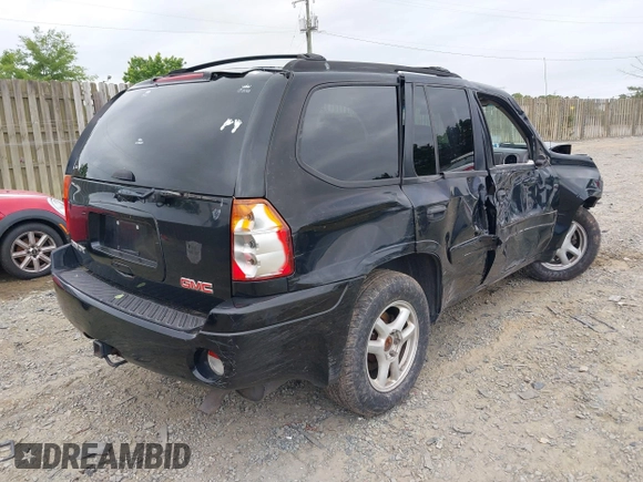 2004 GMC Envoy SLT z VIN 1GKDT13S142113238, wystawiony jako IAAI lot #42232827 z przebiegiem 185 136 mil mil oraz . Historia ofert i sprzedaży dostępna na DreamBid. Obrazek 4.
