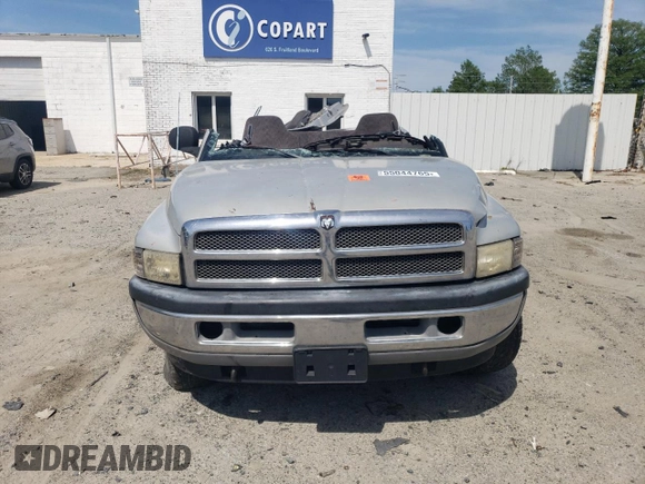 2000 Dodge 1500 z VIN 3B7HF12Z8YG160976, wystawiony jako Copart lot #55044765 z przebiegiem 362 570 mil mil oraz Szkoda całkowita • Salvage title. Historia ofert i sprzedaży dostępna na DreamBid. Obrazek 5.