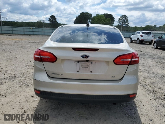 2018 Ford Focus SE z VIN 1FADP3F27JL226890, wystawiony jako Copart lot #56505085 z przebiegiem 112 865 mil mil oraz Szkoda całkowita • Salvage title. Historia ofert i sprzedaży dostępna na DreamBid. Obrazek 6.