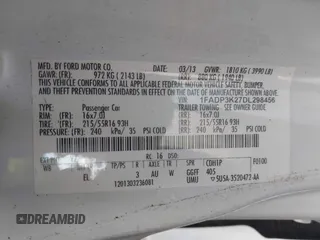 2013 Ford Focus SE with VIN 1FADP3K27DL298456, listed as a IAAI auction lot 42007399 with 111,210 mi miles. Bid and sale history available at carsss.com. Image 9.