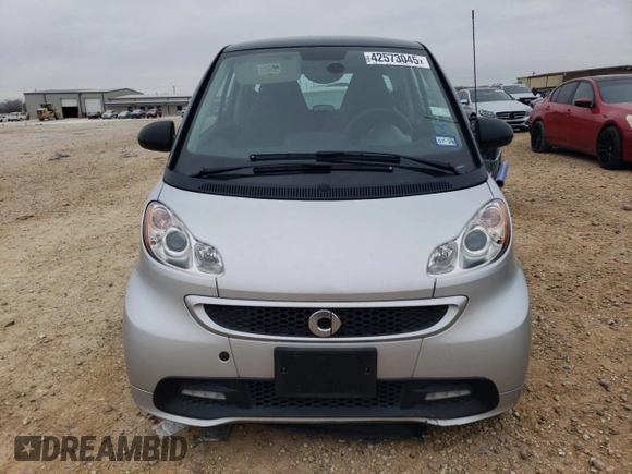 2015 Smart fortwo Passion z VIN WMEEJ3BA2FK815423, wystawiony jako Copart lot #42573045 z przebiegiem 11 588 mil mil oraz Szkoda całkowita • Salvage title. Historia ofert i sprzedaży dostępna na DreamBid. Obrazek 5.