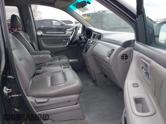 2004 Honda Odyssey EX-L with VIN 5FNRL18914B037976, listed as a IAAI auction lot 41893438 with Not Provided miles and . Bid and sale history available at DreamBid. Image 5.