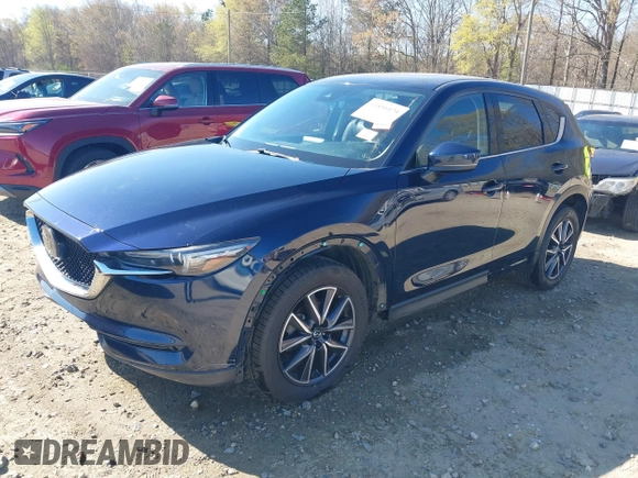 2018 Mazda CX-5 Grand Touring with VIN JM3KFADM1J0322049, listed as a IAAI auction lot 41891079 with 174,939 mi miles and . Bid and sale history available at DreamBid. Image 20.