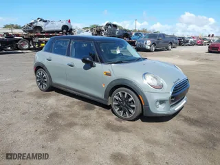 2018 MINI Hardtop 4 Door Cooper with VIN WMWXU1C5XJ2F80038, listed as a IAAI auction lot 40849170 with 66,048 mi miles. Bid and sale history available at carsss.com. Image 1.
