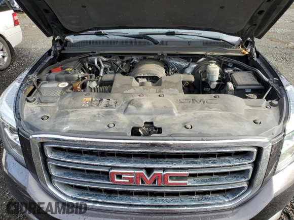 2015 GMC Yukon XL SLT with VIN 1GKS2HKC7FR282543, listed as a Copart auction lot 84996754 with 153,840 mi miles and Clean Title. Bid and sale history available at carsss.com. Image 12.