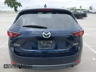 2020 Mazda CX-5 Touring with VIN JM3KFACM2L0856777, listed as a IAAI auction lot 42073972 with 151,628 mi miles. Bid and sale history available at carsss.com. Image 17.