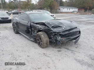 2022 Ford Mustang EcoBoost with VIN 1FA6P8TD3N5132799, listed as a IAAI auction lot 41061018 with Not Provided miles. Bid and sale history available at carsss.com. Image 1.