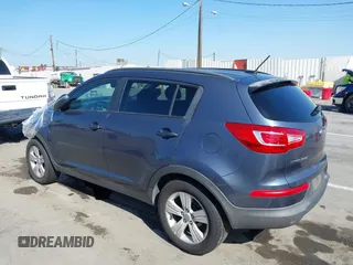 2011 Kia Sportage LX with VIN KNDPB3A23B7137650, listed as a IAAI auction lot 41979477 with 243,186 mi miles and . Bid and sale history available at carsss.com. Image 3.