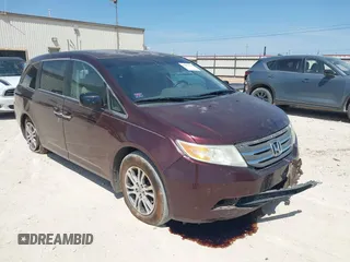 2012 Honda Odyssey EX z VIN 5FNRL5H40CB047070, wystawiony jako IAAI lot #41817134 z przebiegiem 141 978 mil mil oraz . Historia ofert i sprzedaży dostępna na DreamBid. Obrazek 1.