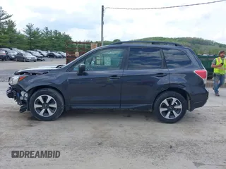 2018 Subaru Forester z VIN JF2SJABC9JH606789, wystawiony jako IAAI lot #42143762 z przebiegiem 70 695 mil mil oraz . Historia ofert i sprzedaży dostępna na DreamBid. Obrazek 15.
