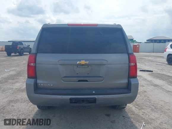 2019 Chevrolet Tahoe LT z VIN 1GNSCBKC8KR406519, wystawiony jako IAAI lot #42145021 z przebiegiem 74 694 mil mil oraz . Historia ofert i sprzedaży dostępna na DreamBid. Obrazek 16.