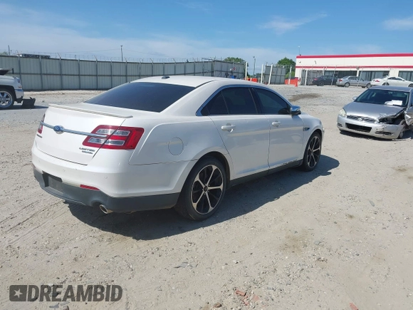 2015 Ford Taurus Limited with VIN 1FAHP2F8XFG175319, listed as a IAAI auction lot 42079604 with 1 mi miles. Bid and sale history available at carsss.com. Image 4.
