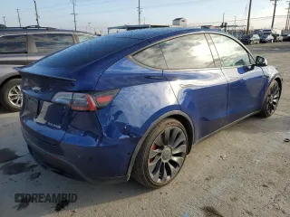 2021 Tesla Model Y Performance z VIN 5YJYGDEF8MF215815, wystawiony jako Copart lot #44752105 z przebiegiem 45 491 mil mil oraz Szkoda całkowita • Salvage title. Historia ofert i sprzedaży dostępna na DreamBid. Obrazek 3.