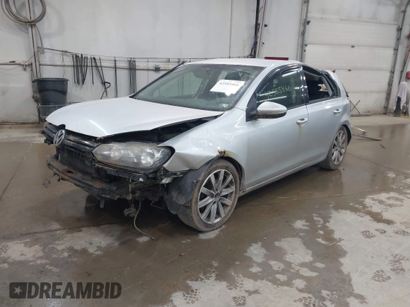 2012 Volkswagen Golf TDI with VIN WVWNM7AJ8CW333137, listed as a IAAI auction lot 42585466 with 213,587 mi miles and . Bid and sale history available at DreamBid. Image 2.