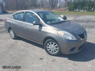 2012 Nissan Versa SV with VIN 3N1CN7AP8CL889109, listed as a IAAI auction lot 42018726 with 123,077 mi miles. Bid and sale history available at carsss.com. Image 1.