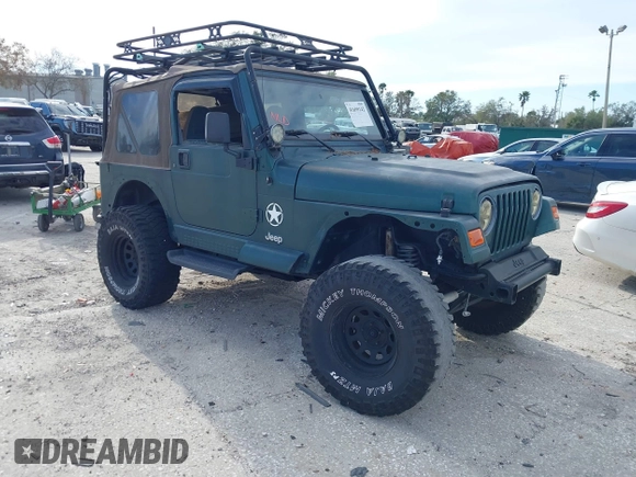 2000 Jeep Wrangler Sahara with VIN 1J4FA59SXYP743190, listed as a IAAI auction lot 41699142 with 1 mi miles. Bid and sale history available at carsss.com. Image 1.