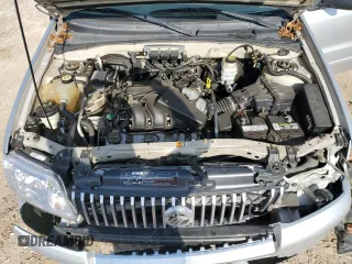 2005 Mercury Mariner Luxury z VIN 4M2YU56195DJ03528, wystawiony jako Copart lot #83315034 z przebiegiem 118 696 mil mil oraz Szkoda całkowita • Salvage title. Historia ofert i sprzedaży dostępna na DreamBid. Obrazek 13.