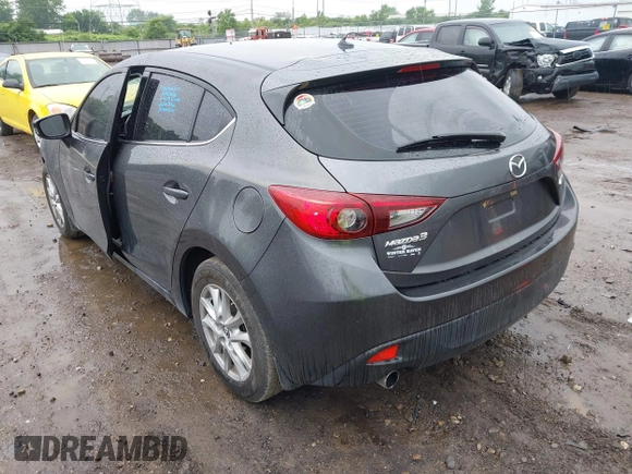 2014 Mazda 3 i Touring z VIN JM1BM1L70E1212930, wystawiony jako IAAI lot #42434348 z przebiegiem 107 209 mil mil oraz . Historia ofert i sprzedaży dostępna na DreamBid. Obrazek 3.