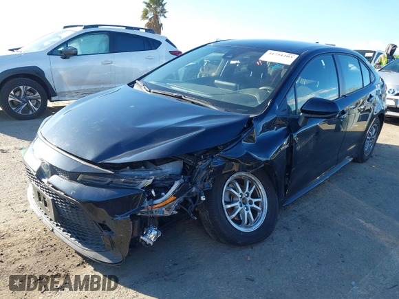 2021 Toyota Corolla Hybrid LE with VIN JTDEAMDE5MJ014959, listed as a IAAI auction lot 41751203 with 26,220 mi miles. Bid and sale history available at carsss.com. Image 17.