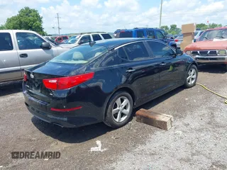2014 Kia Optima LX with VIN 5XXGM4A72EG285974, listed as a IAAI auction lot 42667984 with 232,863 mi miles and . Bid and sale history available at DreamBid. Image 4.
