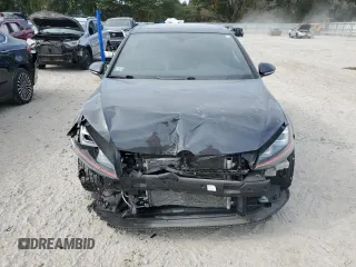 2015 Volkswagen Golf GTI S w/Performance Pkg with VIN 3VWY47AU3FM055868, listed as a Copart auction lot 74148414 with 67,032 mi miles and Salvage Title. Bid and sale history available at carsss.com. Image 5.
