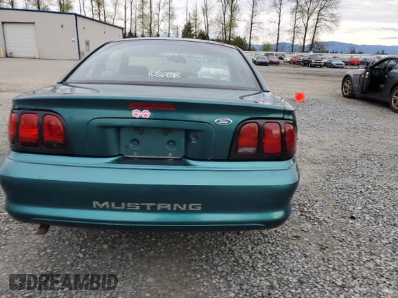 1997 Ford Mustang with VIN 1FALP4044VF101619, listed as a Copart auction lot 52646555 with 189,003 mi miles and Salvage Title. Bid and sale history available at carsss.com. Image 6.
