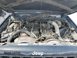 1998 Jeep Cherokee Sport with VIN 1J4FJ68S8WL219208, listed as a Copart auction lot 54593865 with 0 mi miles and Clean Title. Bid and sale history available at carsss.com. Image 12.