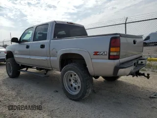 2004 GMC Sierra 1500 SLT z VIN 2GTEK13T241405721, wystawiony jako Copart lot #54399704 z przebiegiem 165 512 mil mil oraz Czysty tytuł • Clean title. Historia ofert i sprzedaży dostępna na DreamBid. Obrazek 2.