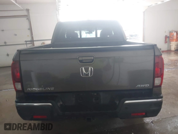 2020 Honda Ridgeline RTL-E with VIN 5FPYK3F75LB001516, listed as a IAAI auction lot 41605859 with 93,902 mi miles and . Bid and sale history available at DreamBid. Image 16.