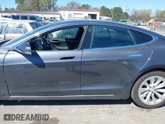 2017 Tesla Model S 100D with VIN 5YJSA1E20HF198503, listed as a IAAI auction lot 41843782 with 77,281 mi miles and . Bid and sale history available at DreamBid. Image 15.