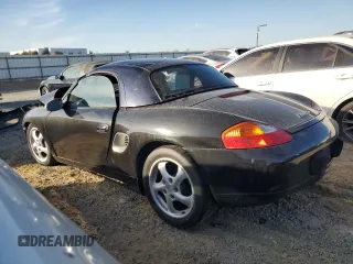 2000 Porsche Boxster z VIN WP0CA2984YU627674, wystawiony jako Copart lot #86027054 z przebiegiem 112 153 mil mil oraz Szkoda całkowita • Salvage title. Historia ofert i sprzedaży dostępna na DreamBid. Obrazek 2.