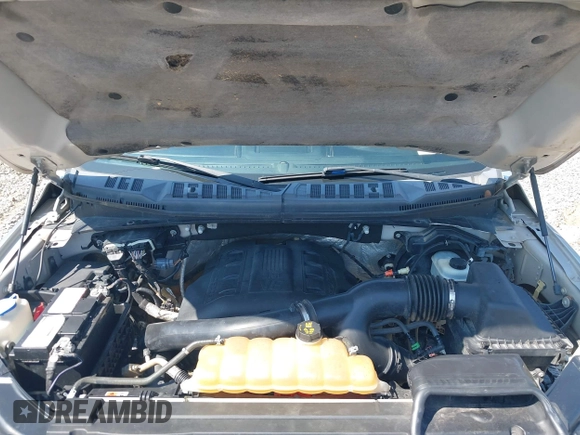 2015 Ford F-150 XLT with VIN 1FTEW1EG9FFD11304, listed as a IAAI auction lot 42590863 with 123,603 mi miles and . Bid and sale history available at DreamBid. Image 10.