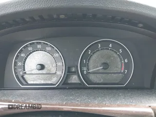 2006 BMW 7 Series 750Li z VIN WBAHN83576DT62514, wystawiony jako IAAI lot #42657343 z przebiegiem Nie podano mil oraz . Historia ofert i sprzedaży dostępna na DreamBid. Obrazek 7.