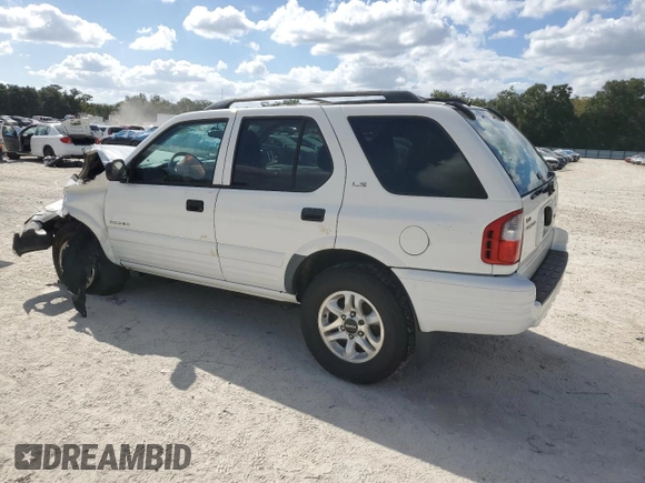 2002 Isuzu Rodeo S with VIN 4S2CK58W124322241, listed as a Copart auction lot 79009994 with 131,793 mi miles and Salvage Title. Bid and sale history available at DreamBid. Image 2.