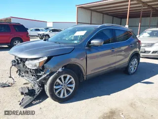 2019 Nissan Rogue Sport SV with VIN JN1BJ1CPXKW242592, listed as a IAAI auction lot 40917011 with 74,018 mi miles. Bid and sale history available at carsss.com. Image 2.