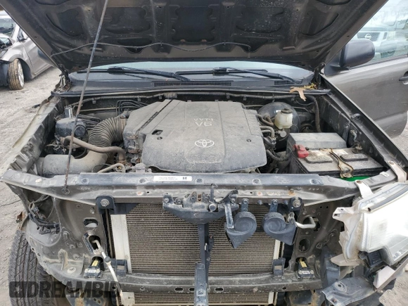 2012 Toyota Tacoma z VIN 3TMLU4ENXCM103392, wystawiony jako Copart lot #57296535 z przebiegiem 80 217 mil mil oraz Czysty tytuł • Clean title. Historia ofert i sprzedaży dostępna na DreamBid. Obrazek 11.