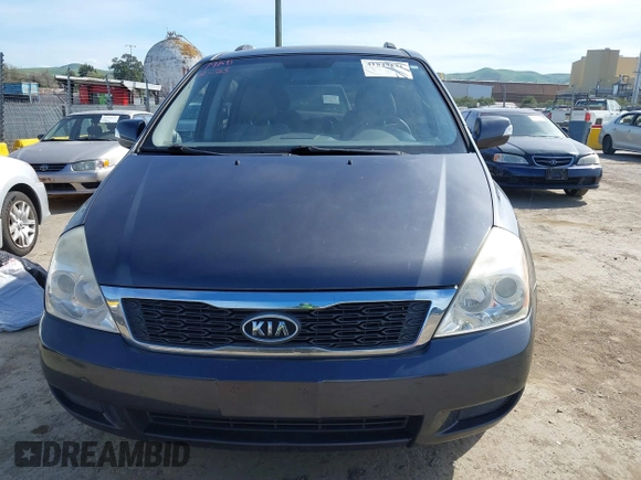 2012 Kia Sedona LX with VIN KNDMG4C7XC6475511, listed as a IAAI auction lot 41845131 with 132,023 mi miles. Bid and sale history available at carsss.com. Image 13.