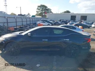 2017 Nissan Maxima SV with VIN 1N4AA6AP7HC428454, listed as a IAAI auction lot 40760431 with 118,659 mi miles and . Bid and sale history available at DreamBid. Image 14.