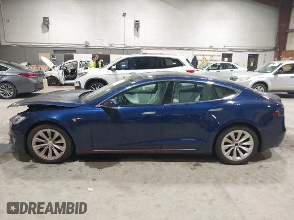 2018 Tesla Model S 75D with VIN 5YJSA1E24JF257817, listed as a IAAI auction lot 41960439 with 61,971 mi miles and . Bid and sale history available at DreamBid. Image 13.