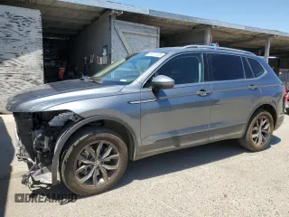 2024 Volkswagen Tiguan SE z VIN 3VV2B7AX0RM000387, wystawiony jako Copart lot #58076205 z przebiegiem 30 466 mil mil oraz Szkoda całkowita • Salvage title. Historia ofert i sprzedaży dostępna na DreamBid. Obrazek 1.