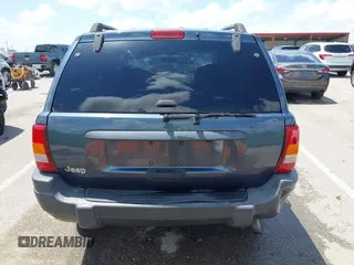 2004 Jeep Grand Cherokee Laredo with VIN 1J4GX48S44C205469, listed as a IAAI auction lot 42310571 with 154,929 mi miles and . Bid and sale history available at DreamBid. Image 16.