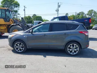 2015 Ford Escape Titanium with VIN 1FMCU0J94FUB24350, listed as a IAAI auction lot 42065641 with 168,215 mi miles. Bid and sale history available at carsss.com. Image 14.