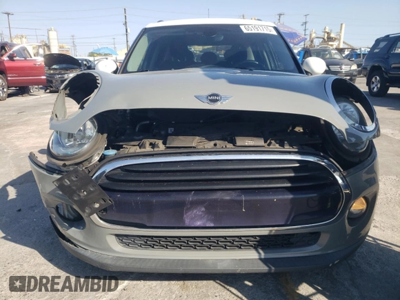2016 MINI Hardtop 4 Door with VIN WMWXU1C59G2D11117, listed as a Copart auction lot 65191715 with 121,633 mi miles and Salvage title. Bid and sale history available at DreamBid. Image 5.