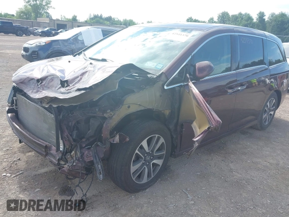 2014 Honda Odyssey Touring with VIN 5FNRL5H90EB120999, listed as a IAAI auction lot 42541370 with 96,454 mi miles and . Bid and sale history available at DreamBid. Image 18.