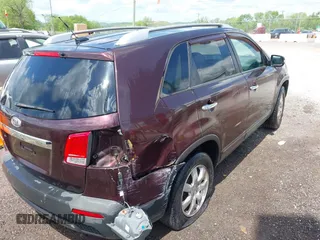 2011 Kia Sorento LX with VIN 5XYKT4A13BG044196, listed as a IAAI auction lot 42080972 with 292,004 mi miles. Bid and sale history available at carsss.com. Image 4.