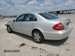 2003 Mercedes-Benz E-Class 3.2L with VIN WDBUF65J43A136441, listed as a Copart auction lot 69109884 with 129,391 mi miles and Salvage Title. Bid and sale history available at carsss.com. Image 2.