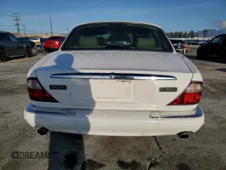 2001 Jaguar XJ with VIN SAJDA23C51LF35586, listed as a Copart auction lot 44105165 with 47,355 mi miles and Salvage title. Bid and sale history available at DreamBid. Image 6.