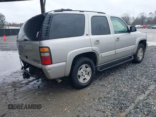 2004 Chevrolet Tahoe LT z VIN 1GNEC13Z04R309134, wystawiony jako IAAI lot #41747014 z przebiegiem Nie podano mil oraz . Historia ofert i sprzedaży dostępna na DreamBid. Obrazek 4.