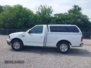 2000 Ford F-150 XL with VIN 1FTZF1720YNB37392, listed as a IAAI auction lot 42460974 with Not provided miles and . Bid and sale history available at DreamBid. Image 14.