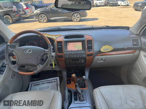 2003 Lexus GX 470 z VIN JTJBT20X830007160, wystawiony jako Copart lot #58235005 z przebiegiem 237 159 mil mil oraz Czysty tytuł • Clean title. Historia ofert i sprzedaży dostępna na DreamBid. Obrazek 10.